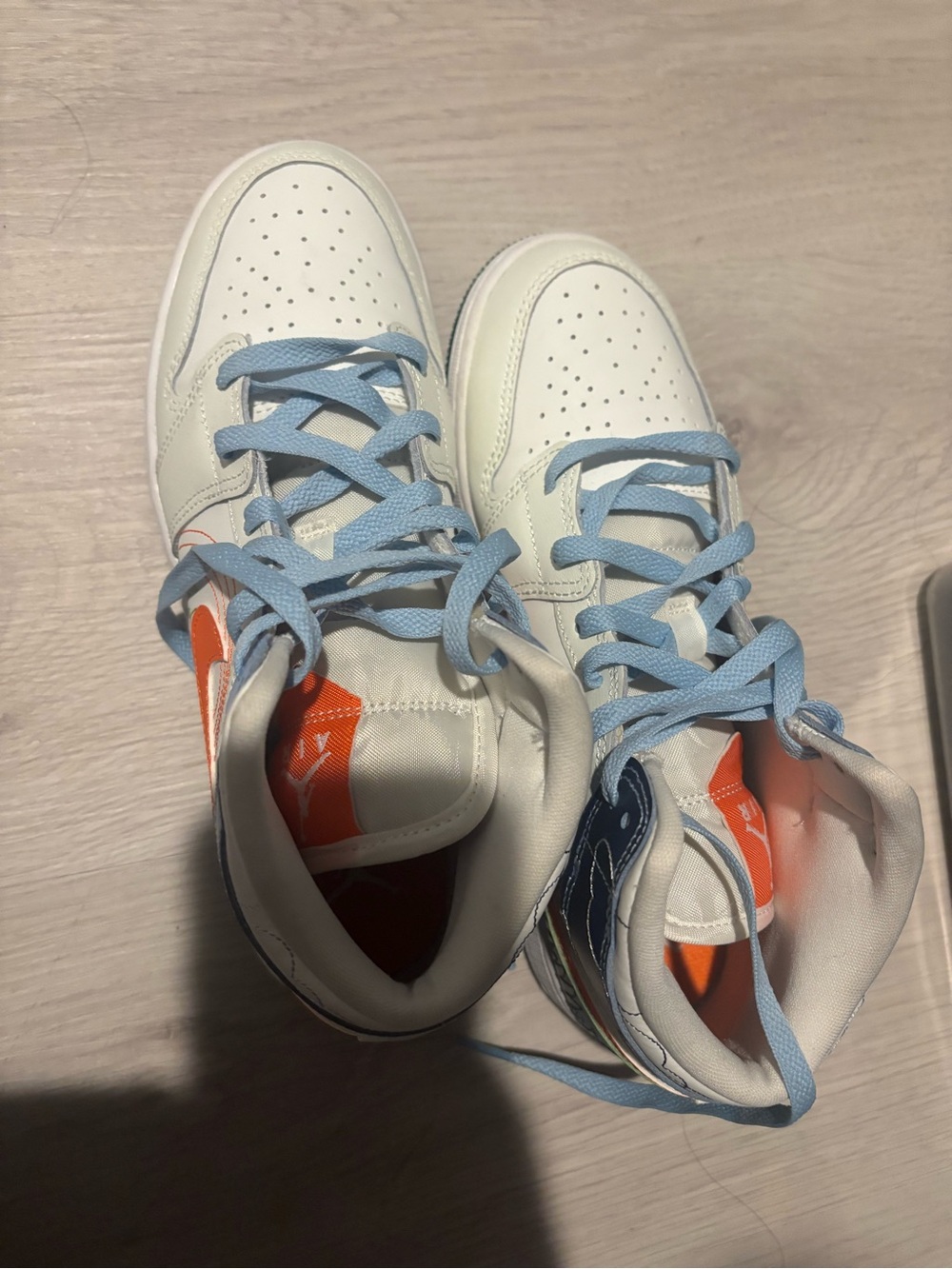Nike Kids Cream-White Sneakers with Light Blue Laces and Orange Accents
